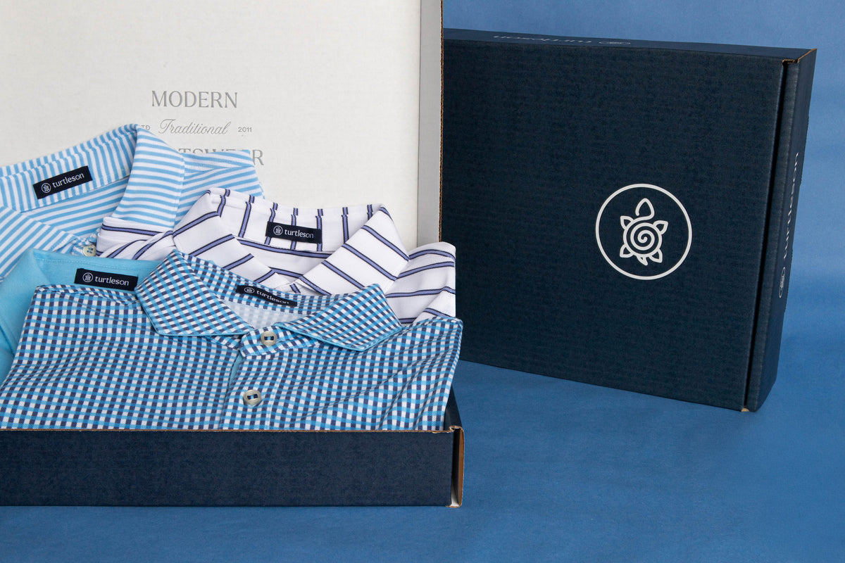 Four assorted Turtleson polos in the new navy Mystery Box. Styles and colors vary.