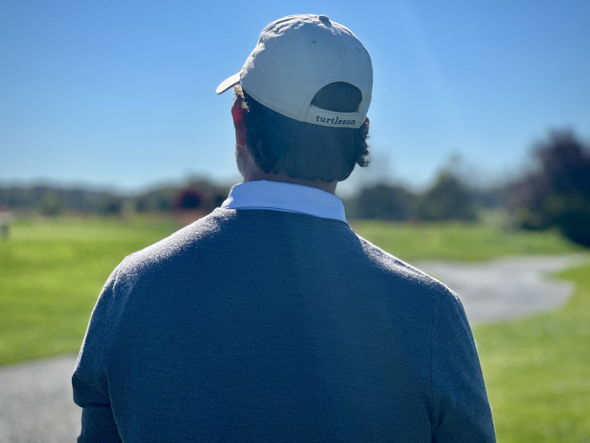 Golfer wearing a Turtleson polo on the course